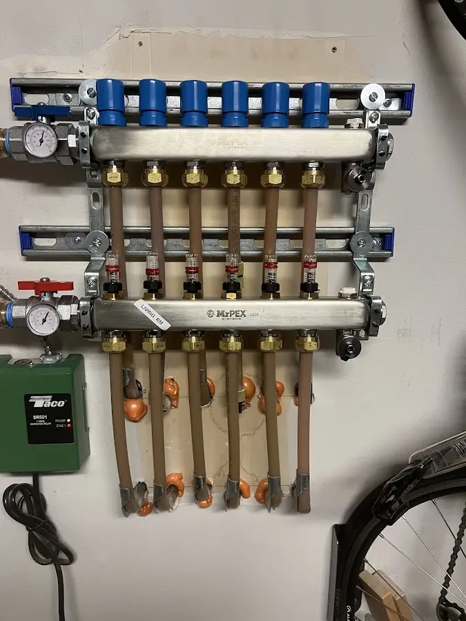 Plumber performing Gas Line Installation at a residential property in Greeley